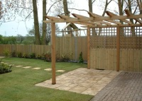 Large arbour with a practical paved area.