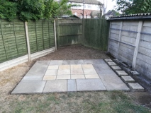 Recycled paving slab shed base